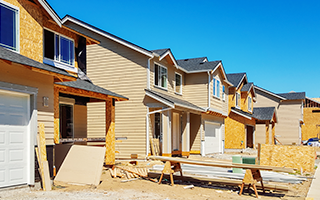 Epoxy resin uses include durable outdoor coatings, like those used in this residential housing development under construction.