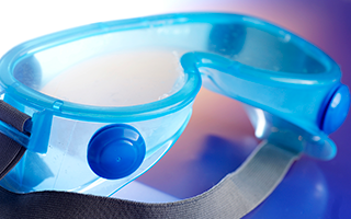 A pair of safety goggles, made with polycarbonate lenses.